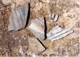 This is an image of pottery shards that were found at an archaeology site at Bandelier National Monument.